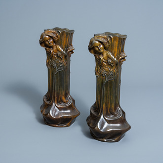Francesco Flora (1857-?): A pair of Italian bronze patinated metal Art Nouveau style vases with flower ladies in relief
