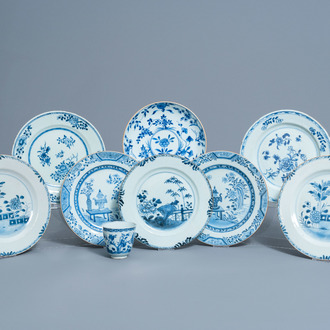 Eight Chinese blue and white plates and a cup with floral design, Kangxi/Qianlong