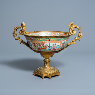 A Chinese Canton famille rose gilt bronze mounted bowl with palace scenes, 19th C.