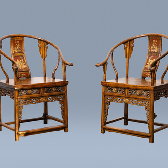 A pair of Chinese partly lacquered and gilt wood horseshoe chairs, 20th C.