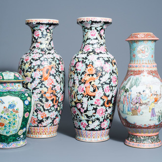 A pair of Chinese famille rose vases with dragons among flowers, an 'Immortals' vase and a vase and cover with floral design, 20th C.
