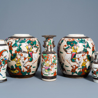 Three Chinese Nanking crackle glazed famille rose vases and a pair of ginger jars with warrior scenes, 19th/20th C.