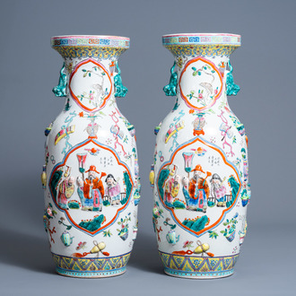 A pair of Chinese famille rose relief moulded vases with antiquities, Guangxu mark, 20th C.