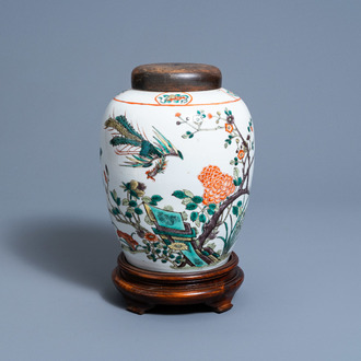 A Chinese famille verte jar with a phoenix among blossoming branches, 19th C.