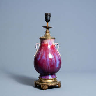 A Chinese flambé glazed 'hu' vase mounted as a lamp, Qianlong mark, 19th/20th C.