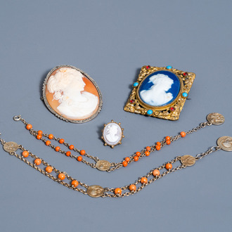 Two cameo brooches, an enamel brooch and two coral bracelets, 19th/20th C.