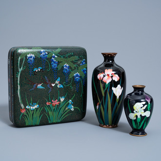 A pair of Japanese cloisonné vases with floral design and a box and cover with birds and butterflies among blossoming branches, Meiji, 19th/20th C.