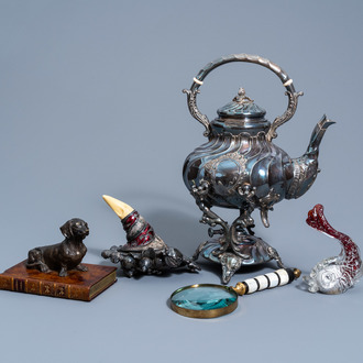 Alessandro Magrino (1958): a silver cornucopia, a silver plated water kettle on burner, a magnifying glass and two sculptures, 20th C.
