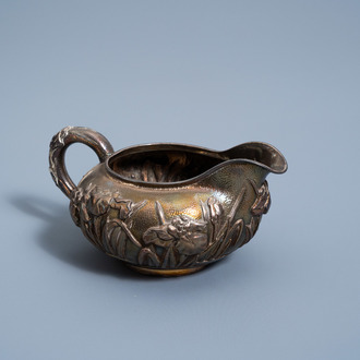 A Japanese silver 'irises' milk jug, Meiji, ca. 1900