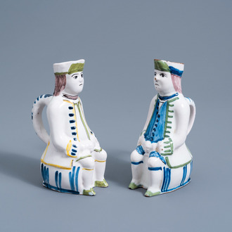 A pair of  polychrome faience figurative 'Jacquot' jugs, Liège or Luxemburg, 18th/19th C.