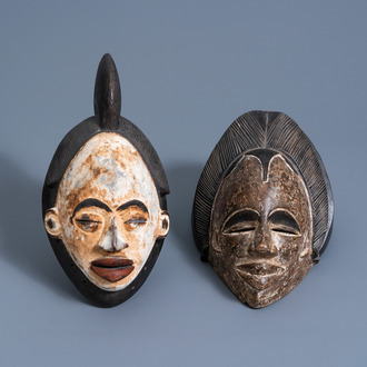 Two wooden 'okuyi/mukuyi' masks, Punu (Bapunu), Gabon, 20th C.