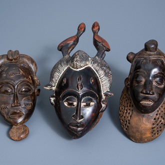 Three various wooden masks, a.o. 'ndoma' masks, Baule and Yaure, Ivory Coast, 20th C.