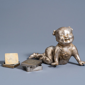 Two Chinese square paktong metal scholar's ink boxes with floral design and a silver plated sculpture of a crawling baby, 20th C.