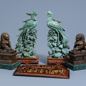 A pair of Chinese bronze Buddhist lions, a pair of soapstone phoenixes and two carved wood reticulated panels, 19th/20th C.