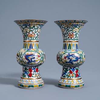 A pair of Chinese white ground wucai style cloisonné yenyen vases with dragons, 20th C.
