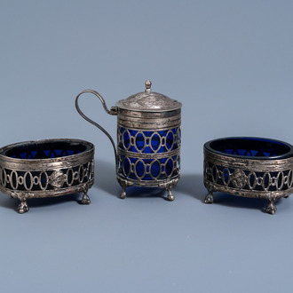 A pair of French silver salts and a mustard pot with blue glass, 19th/20th C.