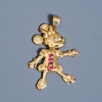 An 18 carat yellow gold pendant set with eight diamonds and four rubies, 20th C.