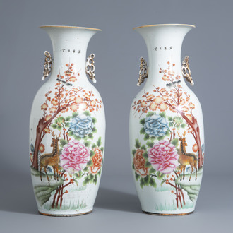 A pair of Chinese famille rose vases with deer among flowering branches, 20th C.