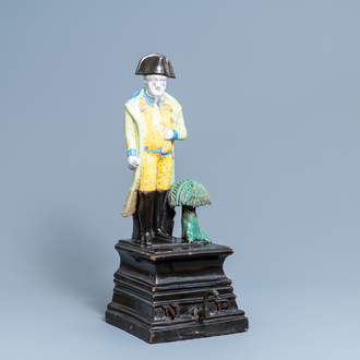 A large polychrome faience table fountain depicting Napoleon, probably Northern France, 18th/19th C.