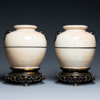 A pair of Chinese globular crackle-glazed vases on reticulated bronze stands, 19th C.