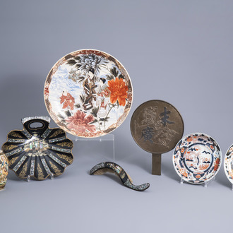 A pair of Japanese Satsuma vases and a dish, a pair of Imari plates, a mirror and a dustpan with brush, Edo/Meiji