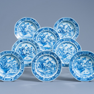 Eight Chinese blue and white saucer plates with an animated river landscape, Qianlong