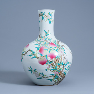A Chinese famille rose 'nine peaches' tianqu ping vase, Qianlong mark, 20th C.