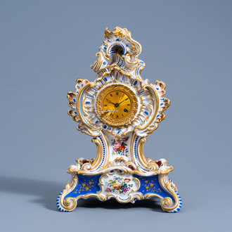A French gilt and polychrome decorated porcelain Louis XV style mantel clock and console with floral design, Jacob Petit, Paris, 19th C.