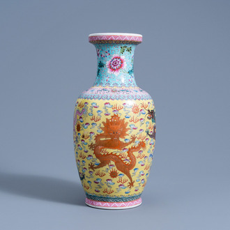 A Chinese famille rose yellow ground 'dragons chasing the pearl' vase, Qianlong mark, 20th C.