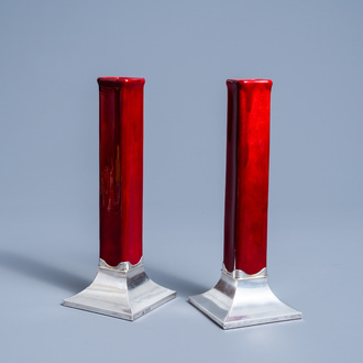 A pair of English red glazed solifleur vases with silver bases, George Betjemann & Sons mark, London, dated 1907