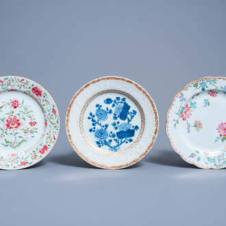 Two Chinese famille rose plates and a blue and white bianco sopra bianco plate with floral design, Qianlong