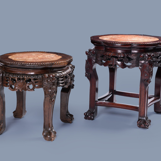 Two Chinese carved wood stands with marble top, 19th/20th C.