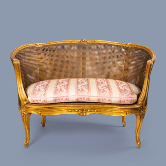 A French gilt wood Louis XV style cannage canapé en corbeille, 19th/20th C.