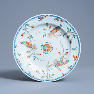 A Chinese Amsterdams bont 'cockatoos' plate with incised underglaze design, Qianlong