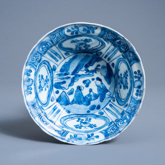 A Chinese blue and white kraak porcelain klapmuts bowl with figures in a landscape, Wanli