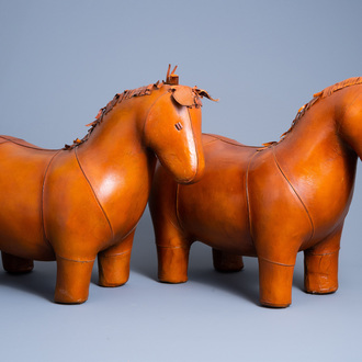 A pair of leather pony ottomans in the manner of Dimitri Omersa (1927-1975), 20th C.