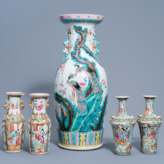 A Chinese famille rose vase with peacocks among blossoming branches and two pairs of Canton vases with palace scenes, 19th C.
