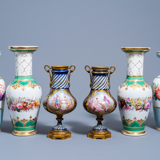 A pair of French gold layered blue ground vases with gallant scenes and two pairs of polychrome decorated vases with floral design, 19th/20th C.