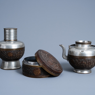A Chinese pewter and carved coconut 'Shou' box and cover, a teapot and a tea caddy, Republic, 20th C.