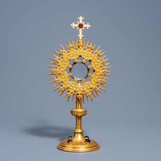 A Belgian Gothic Revival gilt brass sun-shaped monstrance set with cabochons, marked 'Dehin Frères à Liège', last quarter of the 19th C.