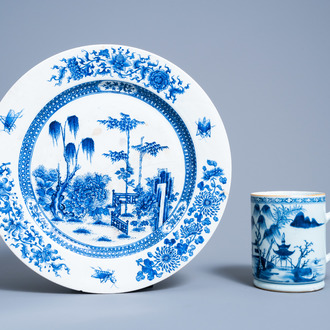 A Chinese blue and white soft paste charger with floral design and a 'landscape' mug, Qianlong
