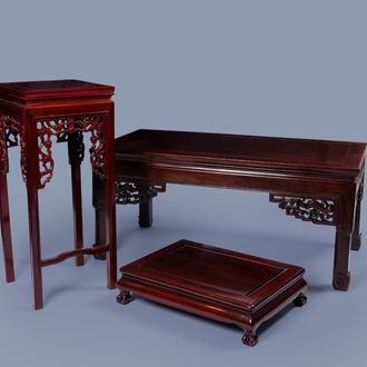Three Chinese wood display stands and tables, 20th C.
