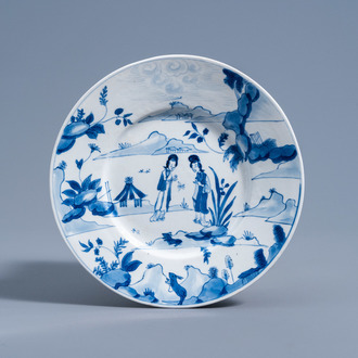 A Chinese blue and white plate with figures in a landscape, Chenghua mark, Kangxi