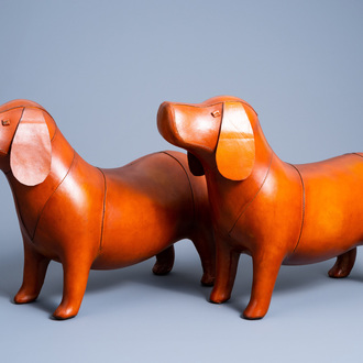 A pair of leather dog ottomans in the manner of Dimitri Omersa (1927-1975), 20th C.