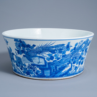 A large Chinese blue and white basin with pheasants in a landscape, 20th C.