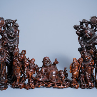 A varied collection of nine Chinese carved wood figures, 19th/20th C.