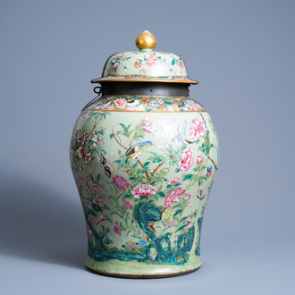 A Chinese Canton famille rose celadon ground vase and cover with birds, parrots and butterflies among blossoming branches, 19th C.