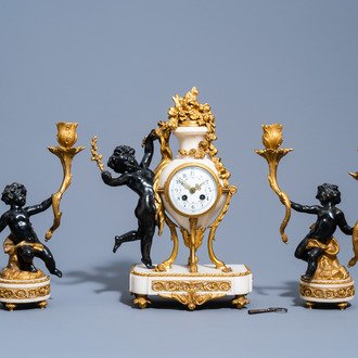 A French gilt and patinated bronze mounted white marble three-piece clock garniture with putti, 19th C.