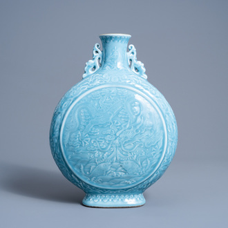A Chinese monochrome lavender blue 'dragon and carps' moon flask, Qianlong mark, 20th C.