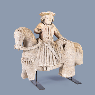 An exceptional French limestone group of Saint Martin on horseback with traces of polychromy, 15th C.